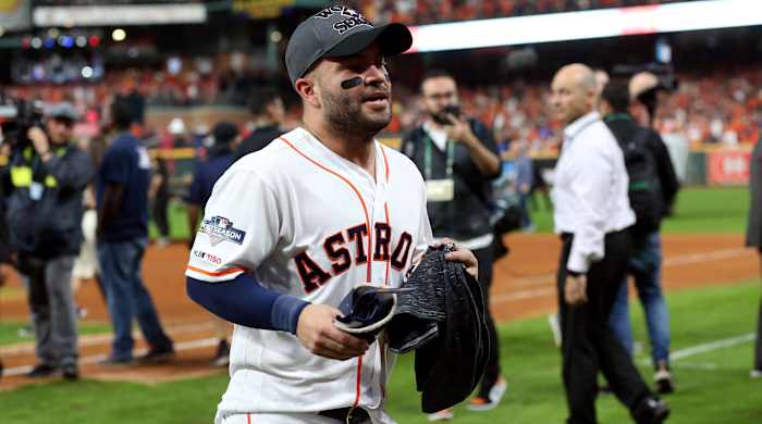 Oct 19, 2019; Houston, TX, USA; Houston Astros second baseman Jose Altuve (27) runs off the field after defeating the New York Yankees in game six of the 2019 ALCS playoff baseball series at Minute Maid Park. Mandatory Credit: Troy Taormina-USA TODAY Sports